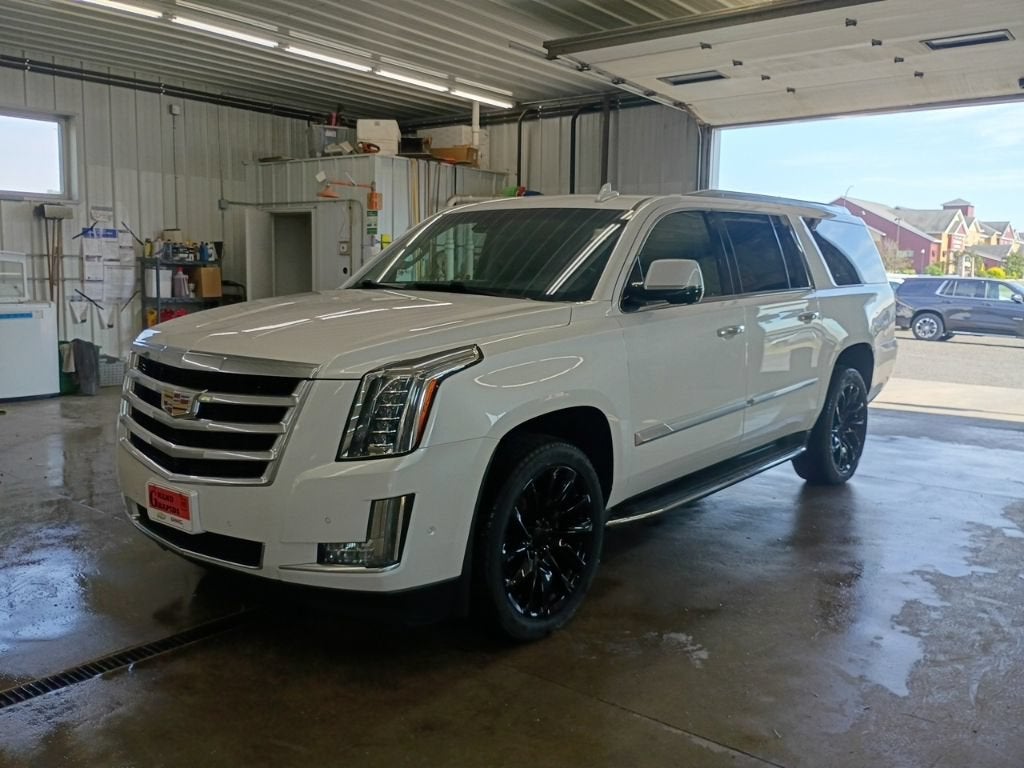 2018 Cadillac Escalade ESV Luxury in Crystal White Tricoat — front three-quarter view